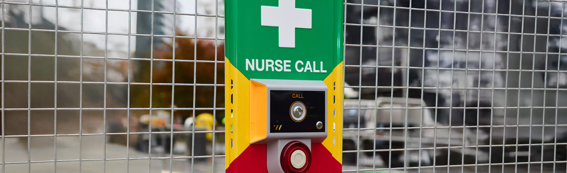 Nurse call button system with green header and yellow frame - desktop banner