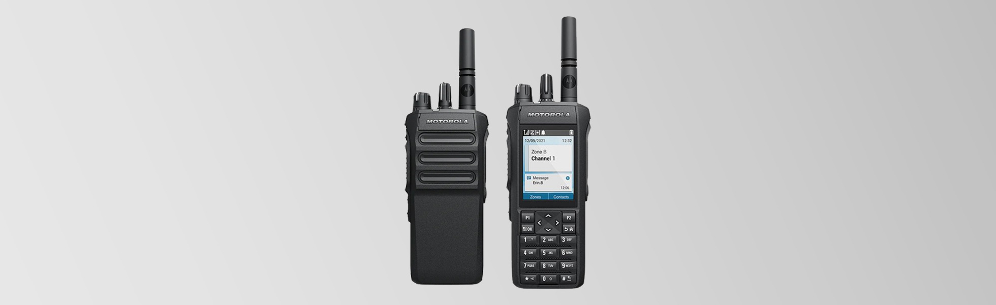 Two Motorola two-way radios - desktop display banner